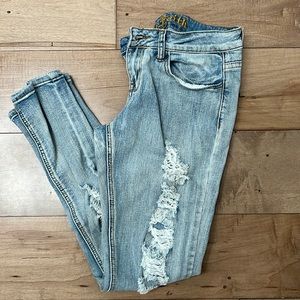 Distressed sandblasted jeans in good condition size 5/6